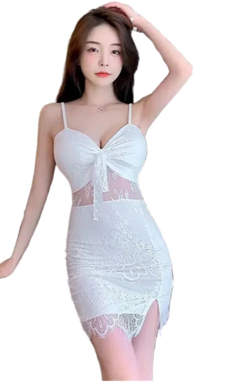 Woman wearing white lace nightclub coquette slip dress with spaghetti straps and front slit