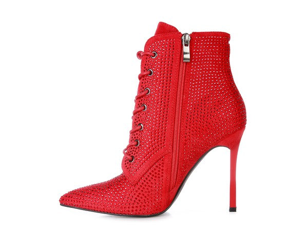 Stylish red ankle boots with sparkly design and lace up closure, perfect for chic outfits