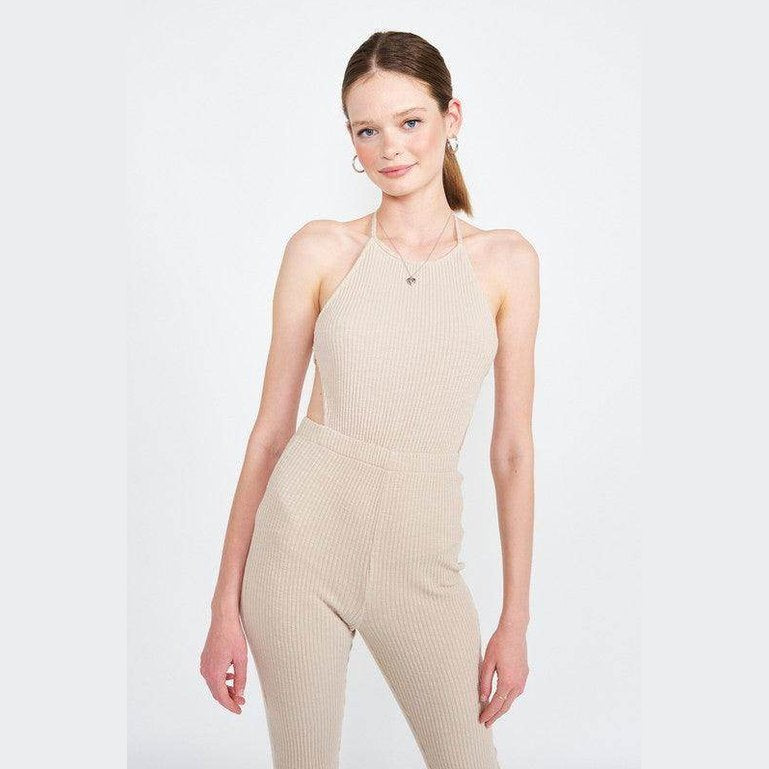 Emory Park open back jumpsuit vacation in beige with ribbed texture and halter neck design