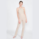 Emory Park open back jumpsuit vacation in beige with a halter neck design, perfect for summer outings.