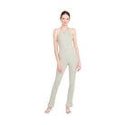 Emory Park open back jumpsuit vacation in light green with sleek design and halter neck