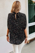 VacationGrabs open back summer tops for women in black with colorful floral pattern and elegant tie detail