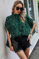 VacationGrabs open back summer tops for women in green with floral print, paired with black shorts