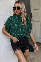 Stylish green women's shirt featuring an open back design, perfect as open back summer tops for women