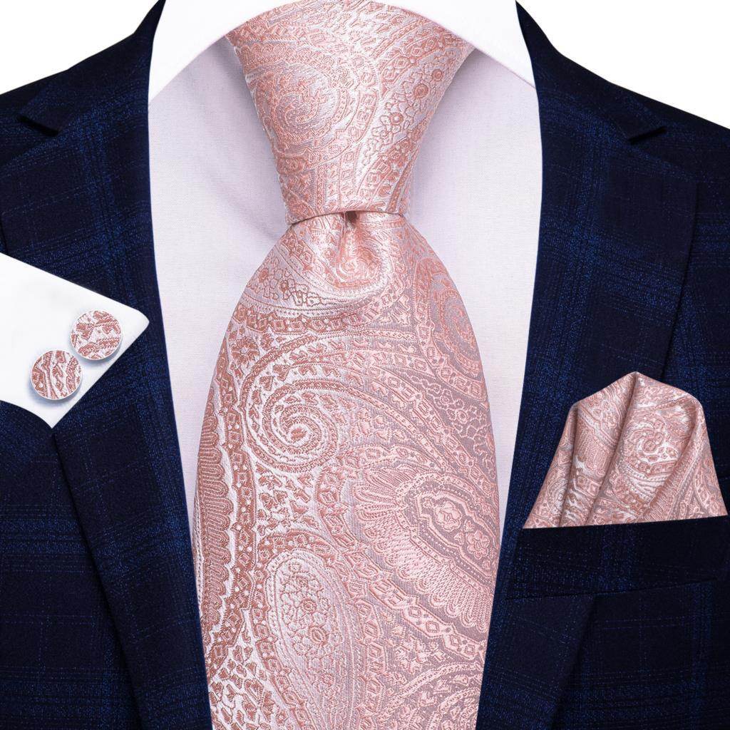 Elegant pink paisley necktie for weddings paired with matching pocket square and cufflinks