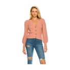 Stylish pink cardigan for women with button closure and puff sleeves, perfect for casual outings