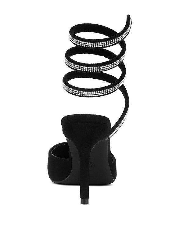 Black stiletto heels with pink embellished strap heels and spiraled rhinestone detailing