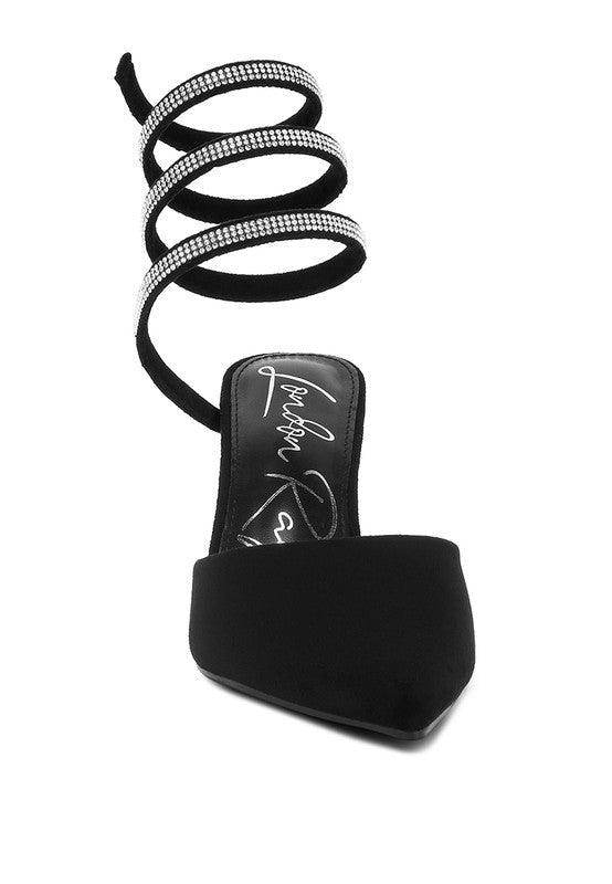 Stylish pink embellished strap heels with a pointed toe and elegant ankle wrap design