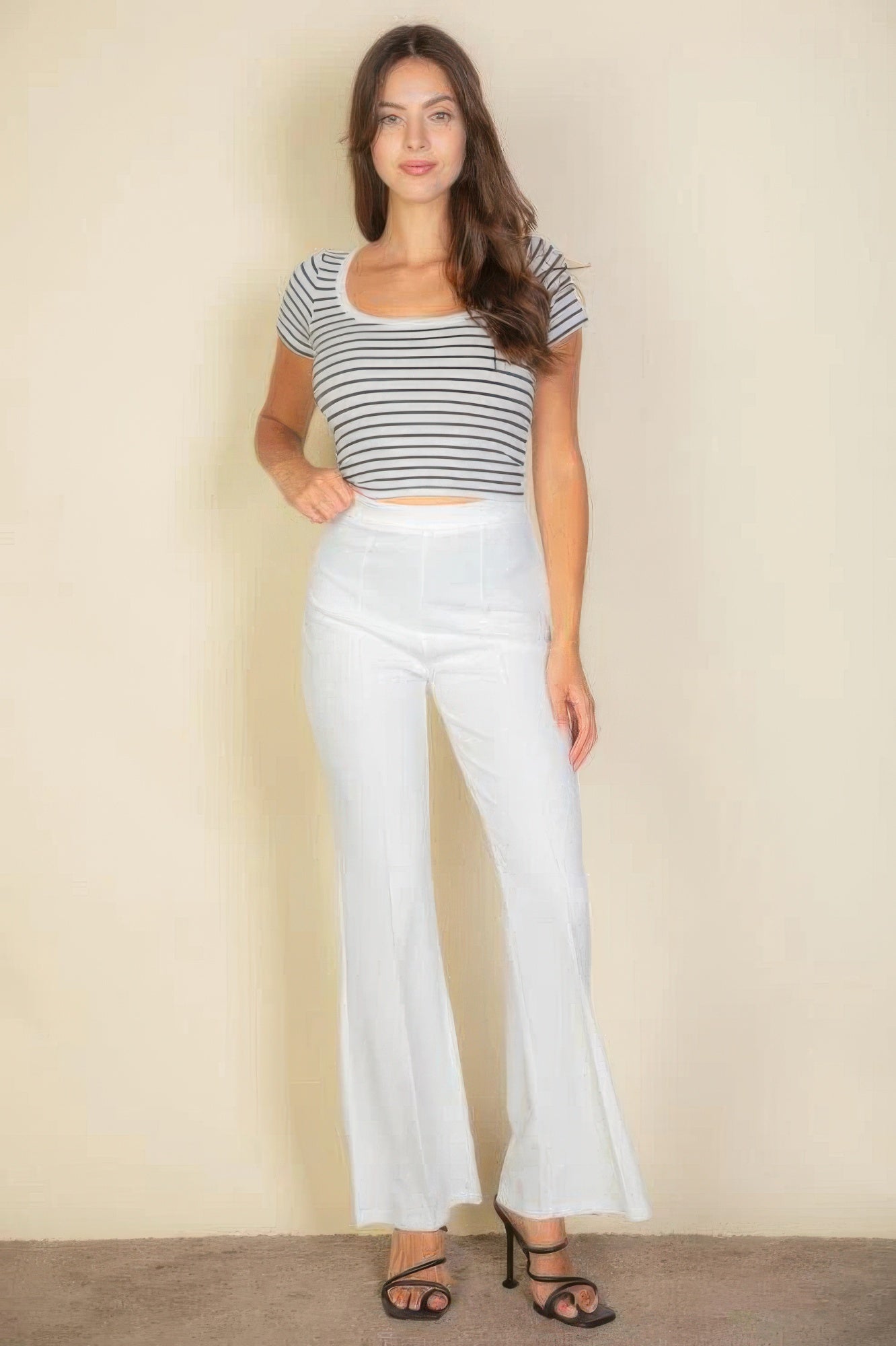 VacationGrabs women's pink flare trousers for women styled with a striped crop top and black heels