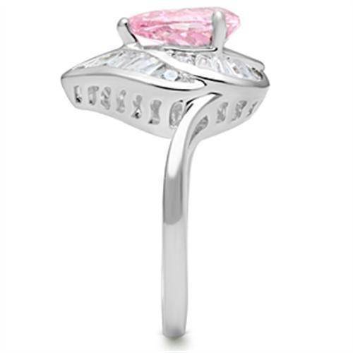 Elegant pink gemstone silver ring featuring a marquise-cut pink stone and sparkling accents