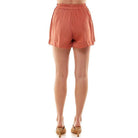 Back view of TCEC pink summer shorts for women, featuring a relaxed fit and comfortable waistband