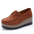 Brown VacationGrabs platform slip-ons for travel with a stylish design and comfortable fit