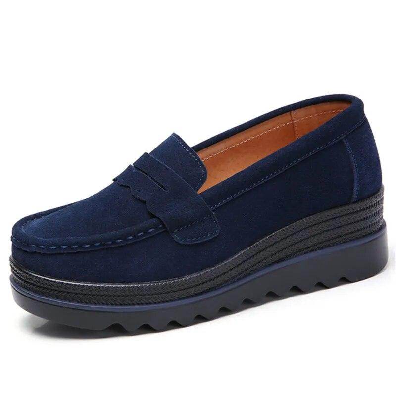 Navy platform slip-ons for travel with comfortable cushioning and stylish design