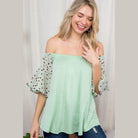 Light green plus size off shoulder top with animal print sleeves for a stylish summer look