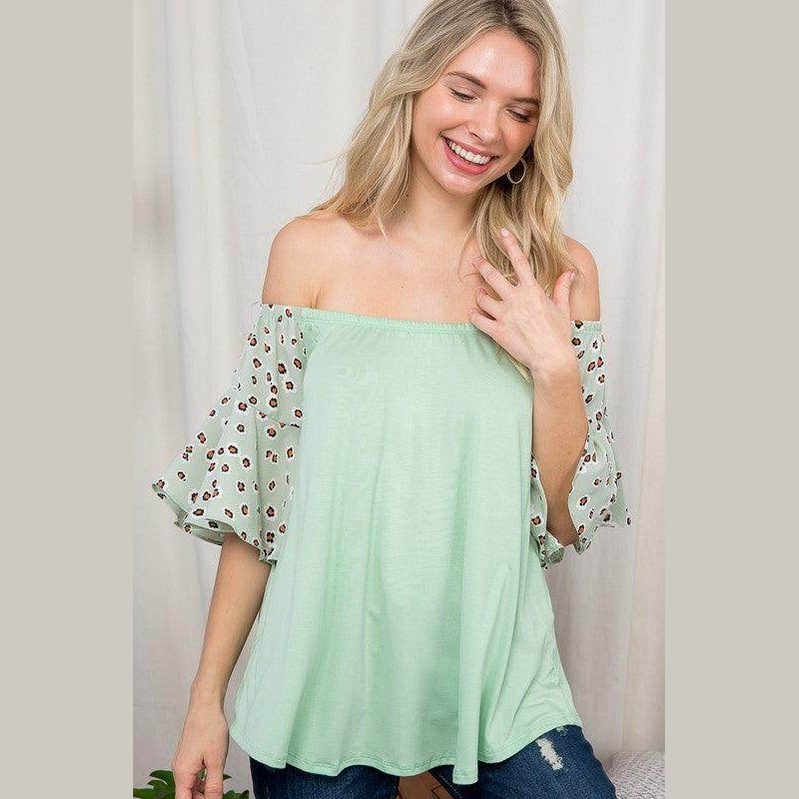 Light green plus size off shoulder top with animal print sleeves for a stylish summer look
