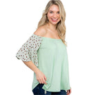 e Luna plus size off shoulder top in mint green with stylish patterned sleeves