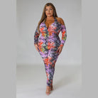 Plus size snake print jumpsuit with halter neck and cutout shoulder detailing by VacationGrabs