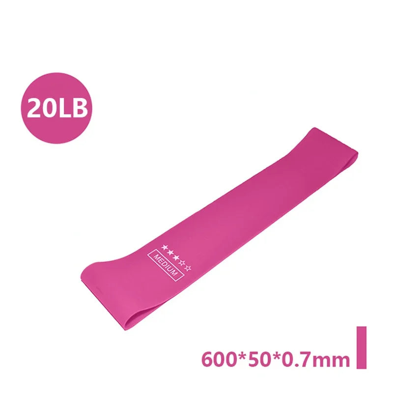 Pink portable resistance bands for women, ideal for home workouts