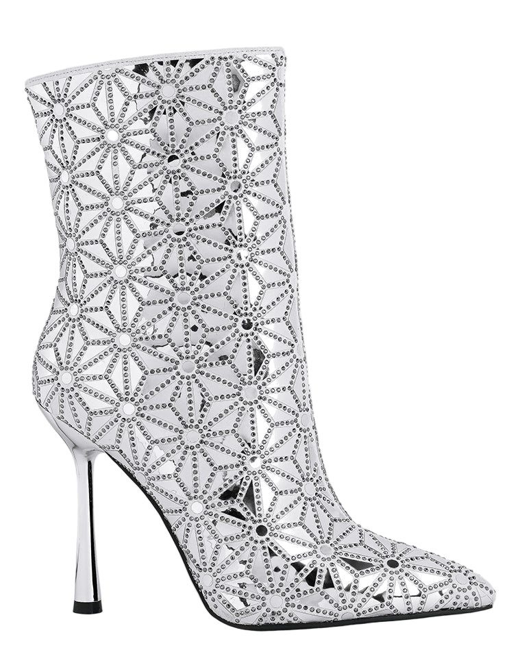 Silver stiletto heel boot with geometric pattern on a white background
