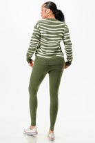 Stylish pullover sweater and pant set for women in green with a striped design, perfect for casual outings