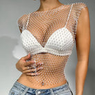 Rhinestone fishnet crop top shell only with sparkling bead details over white bra and jeans