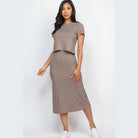Capella ribbed midi skirt set in taupe worn by woman with short sleeve top and midi skirt