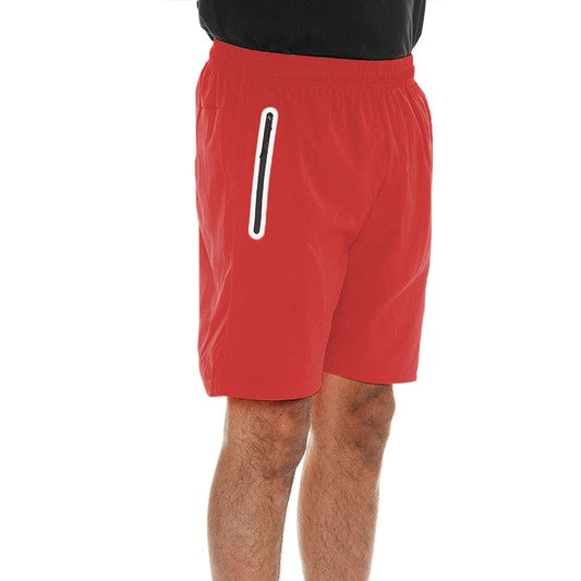 WEIV men's red running shorts with zip pocket shown from side view with white sneakers