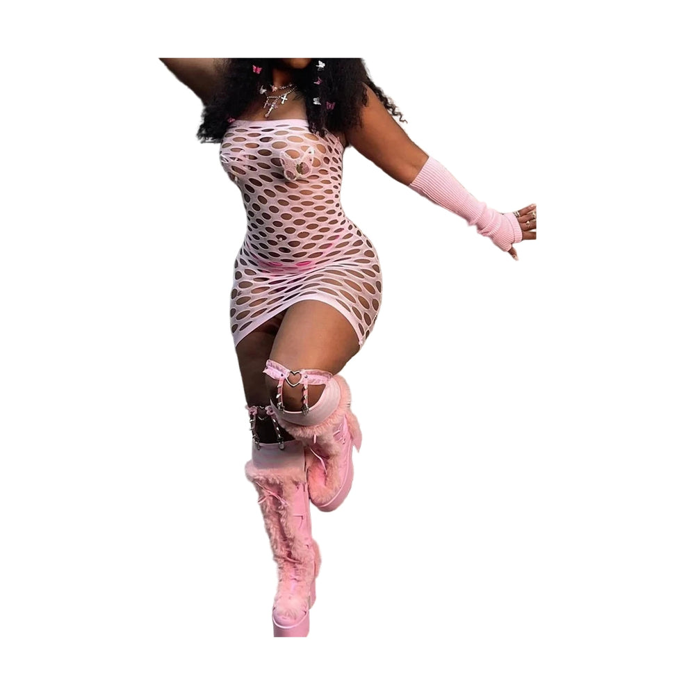Woman wearing a pink see through mesh club dress paired with pink furry boots and arm warmers