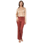 VacationGrabs women's sequined fit and flare pants clubwear in rose gold styled with beige satin blouse