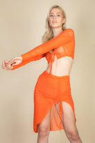 VacationGrabs women's sexy sheer mesh skirt cover up in vibrant orange with side ties