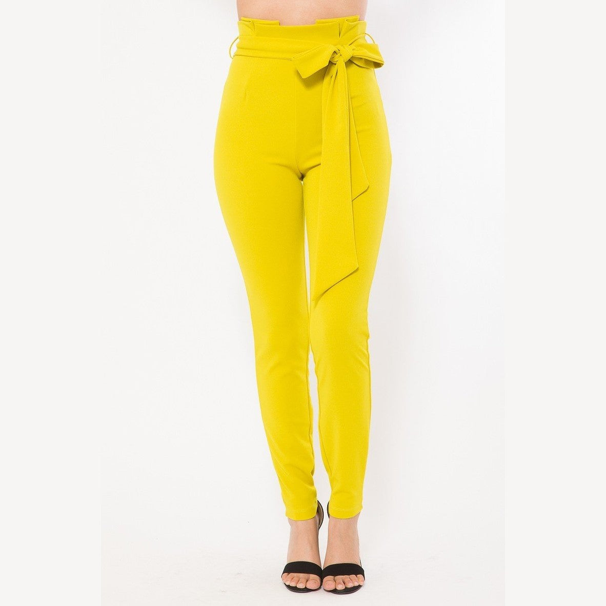 VacationGrabs women's yellow skinny pants with belt accent in a high waist design