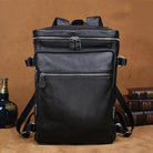 Soft leather travel backpack in black featuring multiple zippered compartments and durable straps