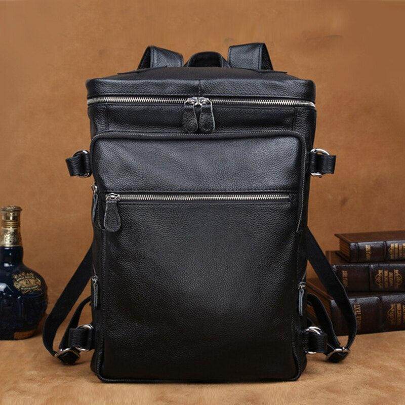 Soft leather travel backpack in black featuring multiple zippered compartments and durable straps