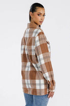 Women wearing a soft plaid shacket for women in brown and gray tones with a relaxed fit