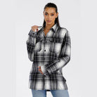 Soft plaid womens shacket in black and white with a relaxed fit and button closure