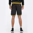 Back view of black soft velour athletic shorts with yellow Greek key pattern trim by WEIV