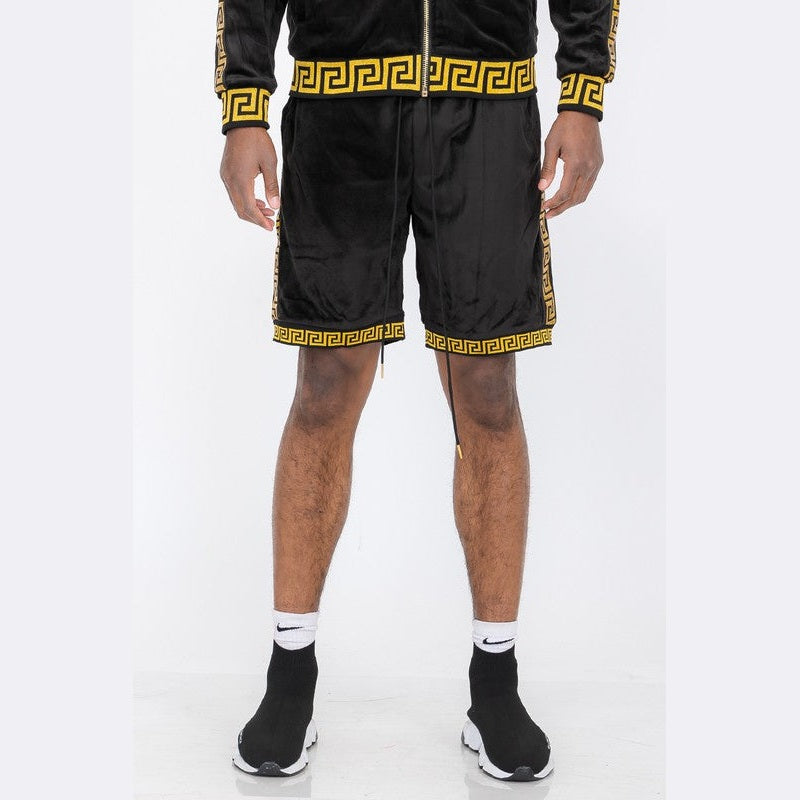 WEIV black soft velour athletic shorts with gold patterned trim worn by male model
