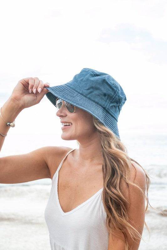 Aili's Corner solid color vacation hat perfect for sunny days by the beach or pool.
