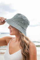 Aili's Corner solid color vacation hat in gray, perfect for beach days and sunny outings