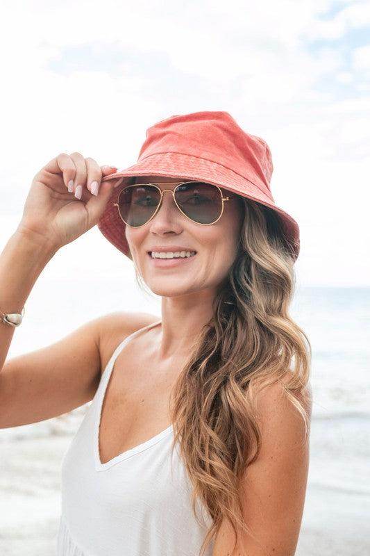 Aili's Corner solid color vacation hat in coral, perfect for sunny beach days and outdoor fun
