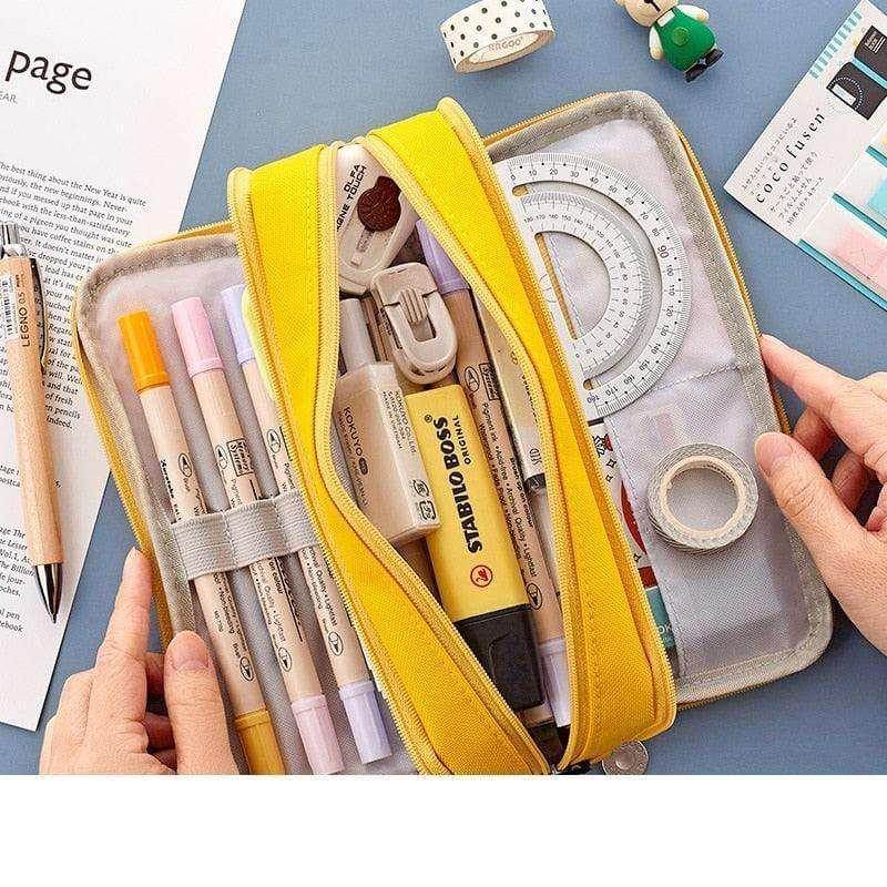VacationGrabs dual side pencil case in yellow filled with various stationery supplies for organizing tools