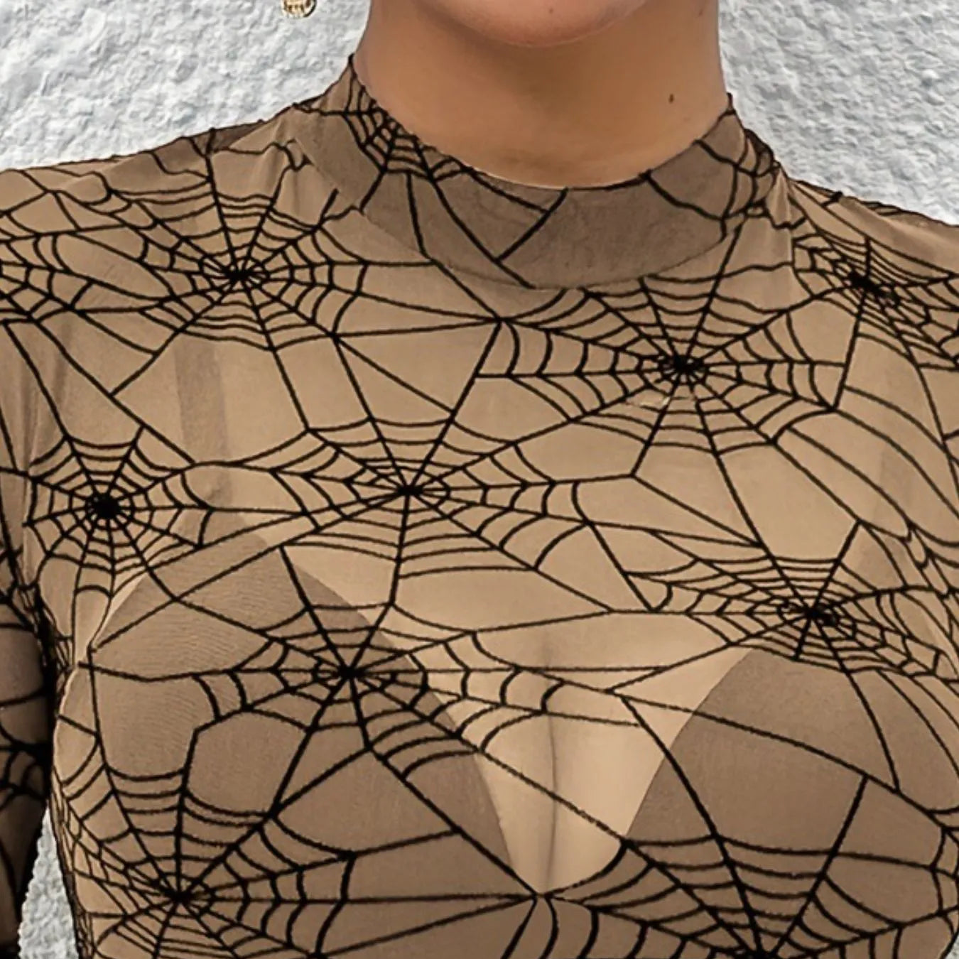 Trendsi women's spider web print blouse in a sheer design for a stylish and trendy look