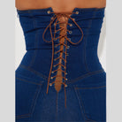 Strapless denim jumpsuit featuring a corset lace-up back design for a stylish summer look