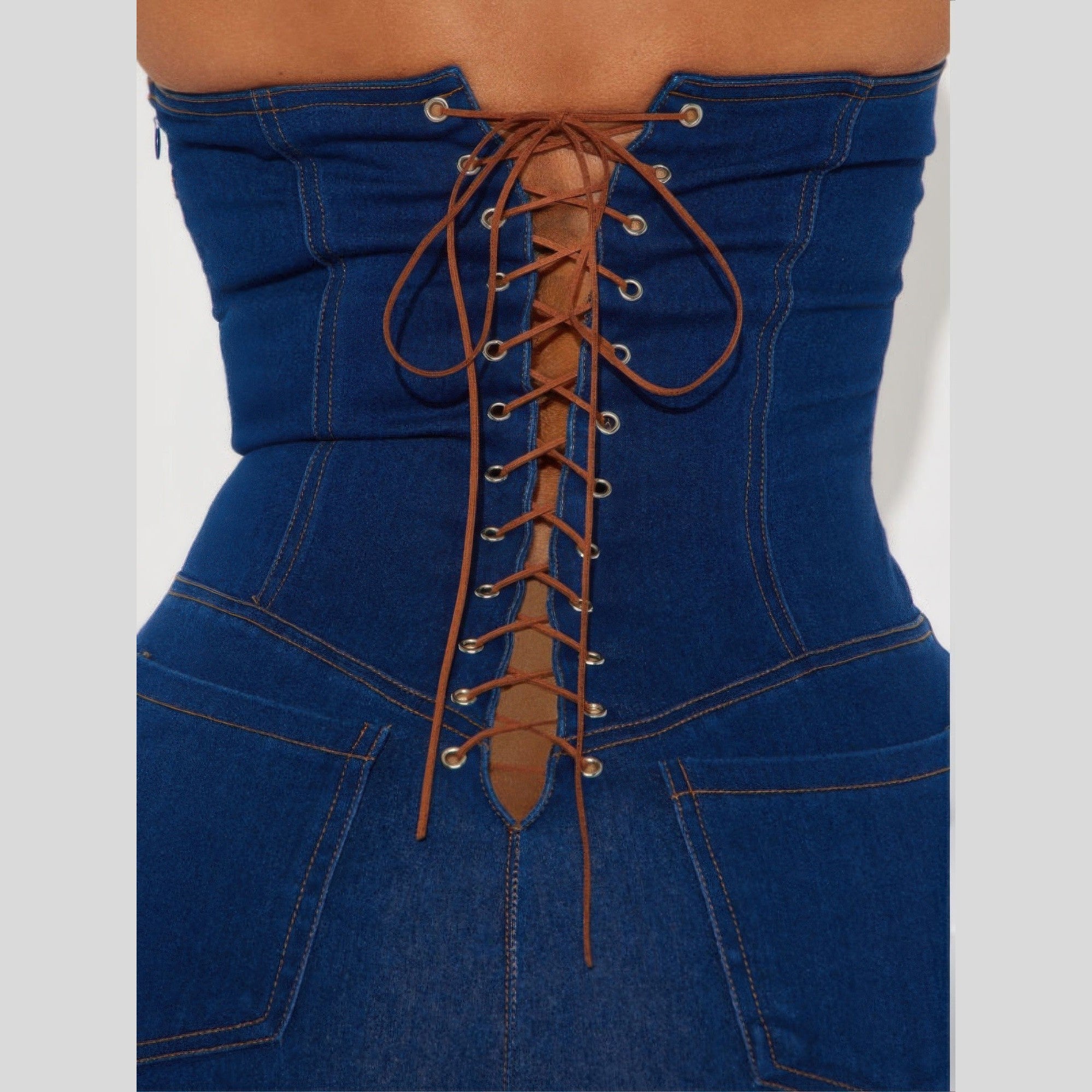 Strapless denim jumpsuit featuring a corset lace-up back design for a stylish summer look