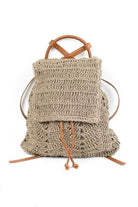 Light beige straw beach backpack with adjustable straps and drawstring closure for summer outings