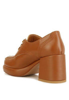 Stylish block heel shoes in tan leather with a sleek design for fashionable women