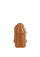 Back view of stylish block heel shoes in tan leather for women, perfect for everyday wear