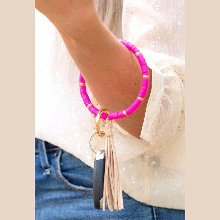 Aili's Corner stylish bracelet key holder in vibrant colors with tassel and key rings for easy access