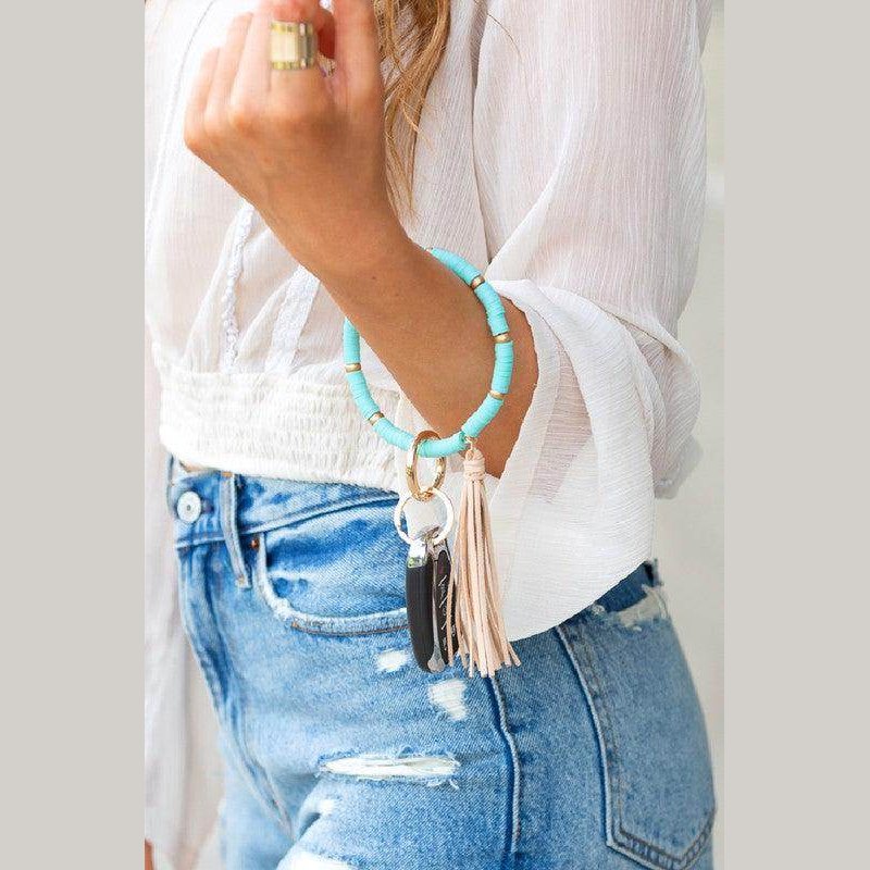 Aili's Corner stylish bracelet key holder with turquoise beads and tassel, perfect for on-the-go use