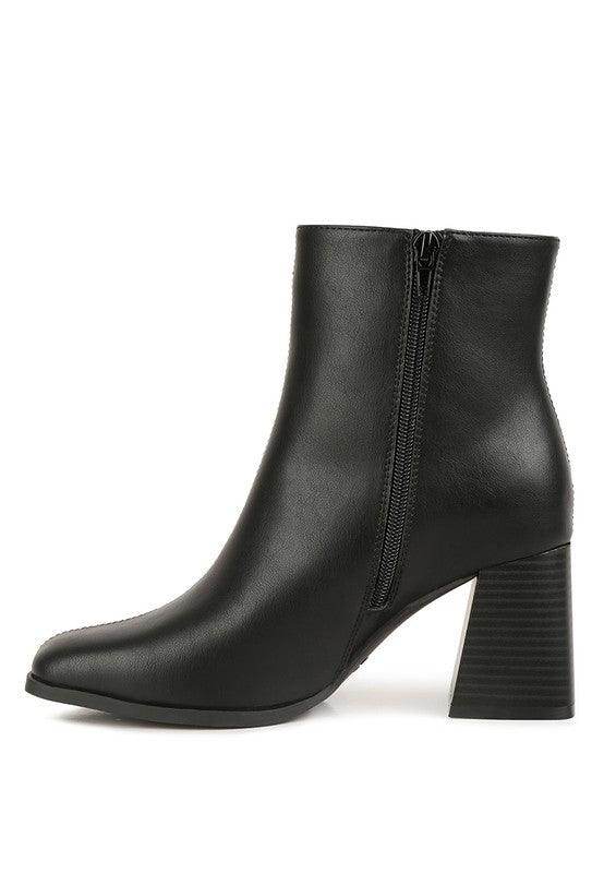 Stylish Brown Chelsea Boots with a sleek design and block heels for fashionable women
